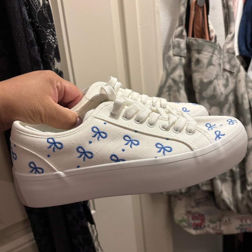 NWT white sneakers with blue bows